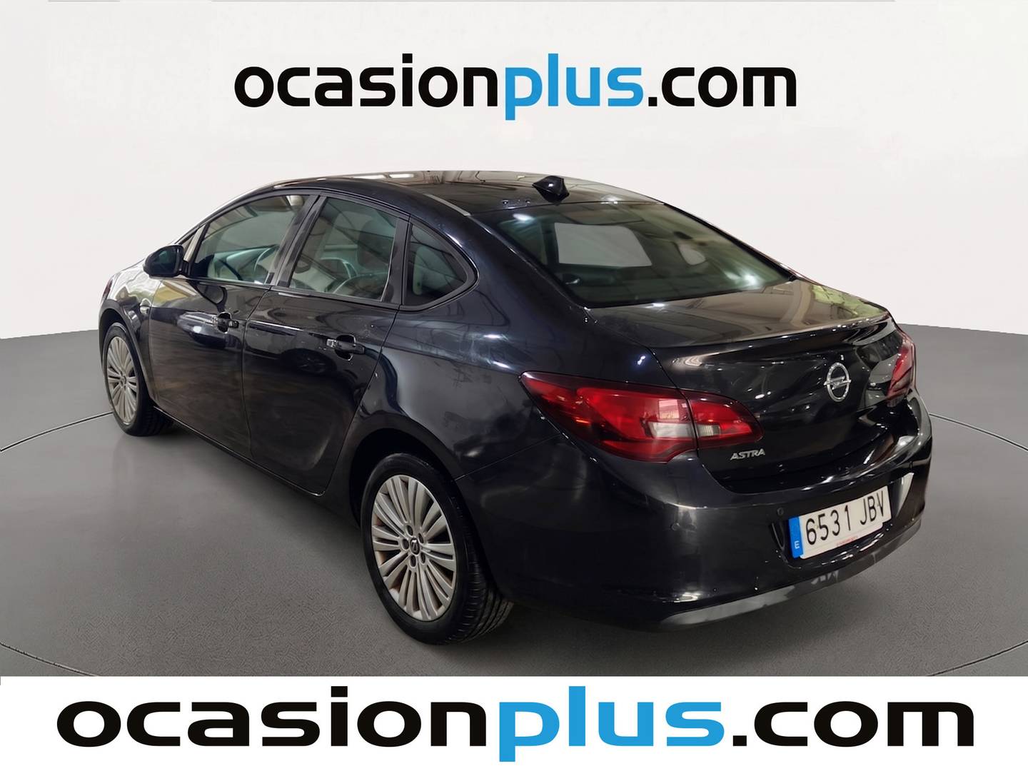 Foto trasera Opel Astra Opel Astra 1.6 Sedan Selective (115 CV) izquierda