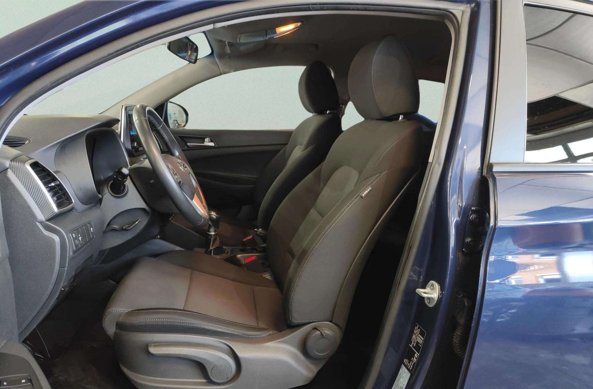 Hyundai Tucson 1.6 GDI BlueDrive Essence 4x2 - foto 11