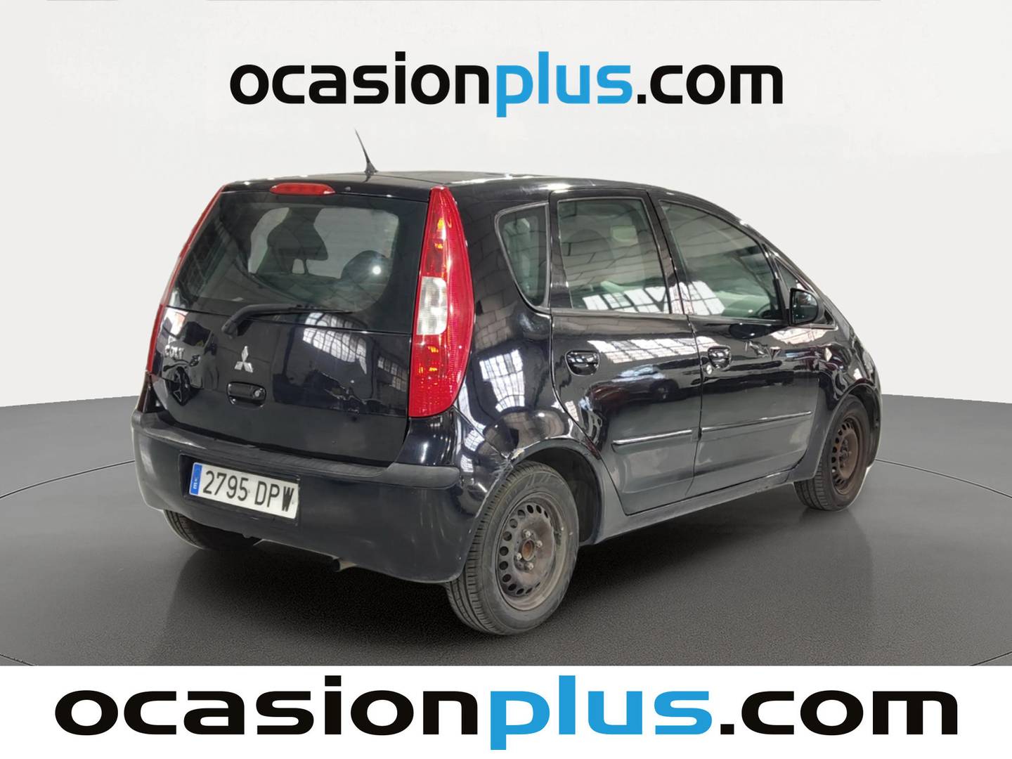Foto trasera Mitsubishi Colt Mitsubishi Colt 1.1 12v Invite 75 CV derecha