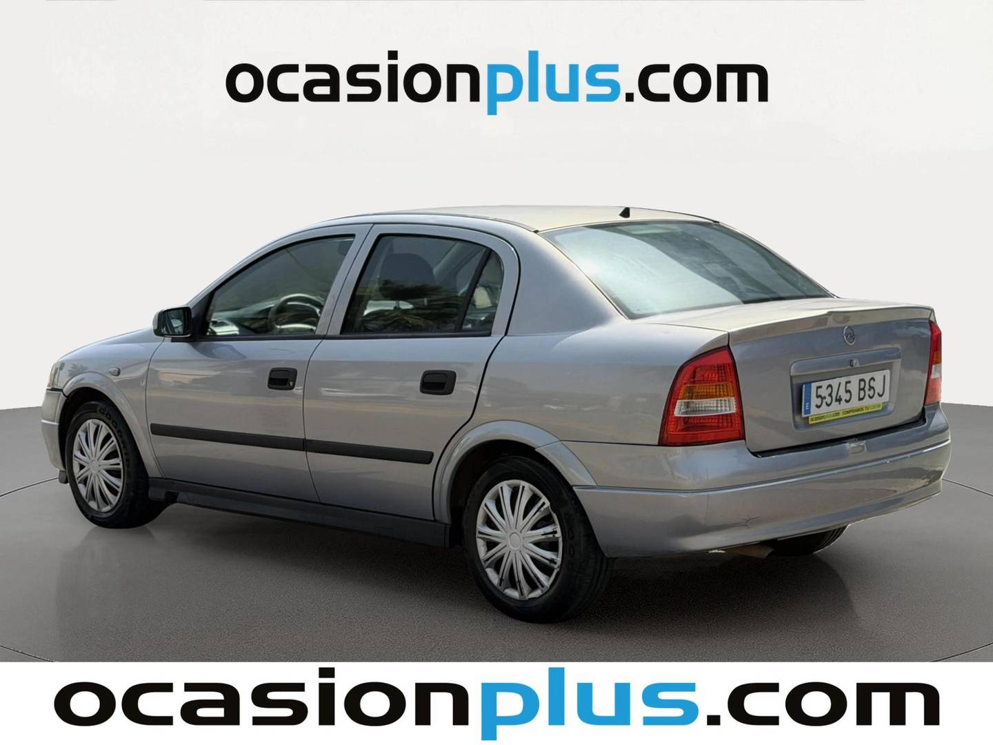 Foto trasera Opel Astra Opel Astra 1.6 Sedan Club (84 CV) izquierda