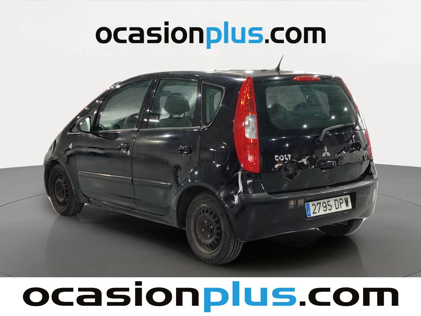 Foto trasera Mitsubishi Colt Mitsubishi Colt 1.1 12v Invite 75 CV izquierda