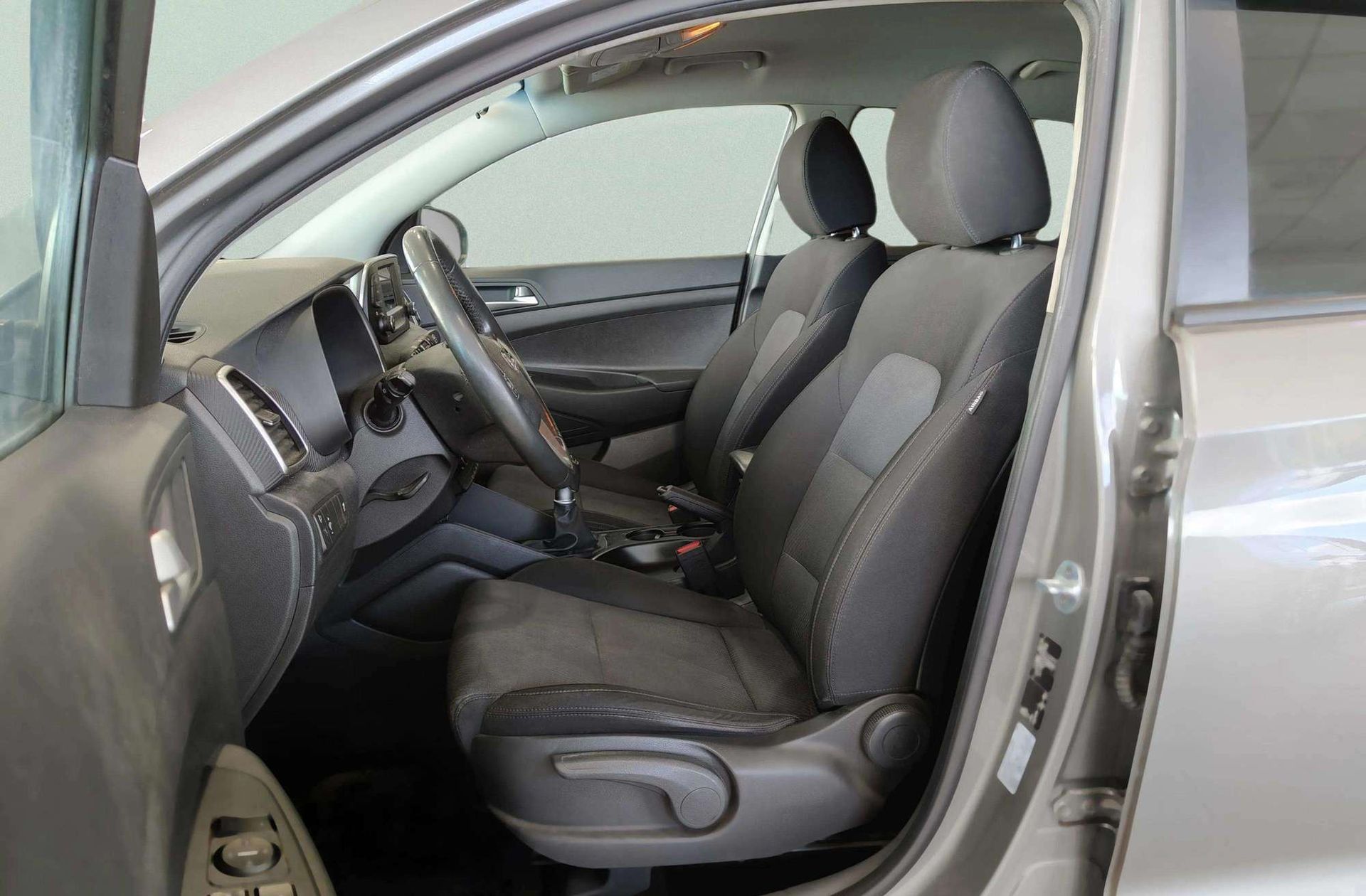 Hyundai Tucson 1.6 GDI BlueDrive Essence 4x2 - foto 9